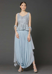 Powder Blue Sleeveless Peplum Top And Matching Skirt With Cowl Drape Online - Kalki Fashion