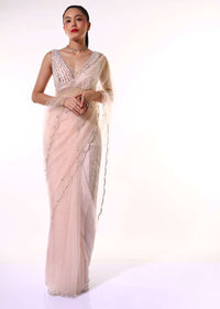 Powder Peach Saree In Net With Mirror Embroidered Scallop Cut Border And Ready Stitched Blouse