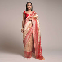 Powder Peach Saree In Silk With Woven Floral Jaal And Red Patola Pallu