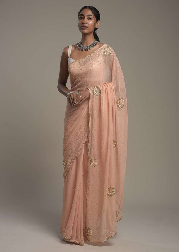 Powder Peach Shimmer Georgette Saree With Scattered Sequins And Moti Motifs Along With Unstitched Blouse Online - Kalki Fashion