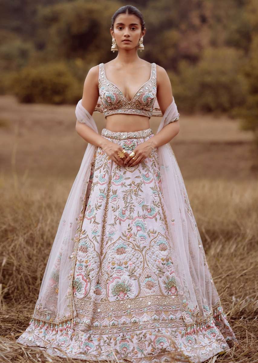 Powder Pink Lehenga Choli In Raw Silk With Colorful Resham And Cut Dana Embroidered Summertime Flowers And Mughal Motifs