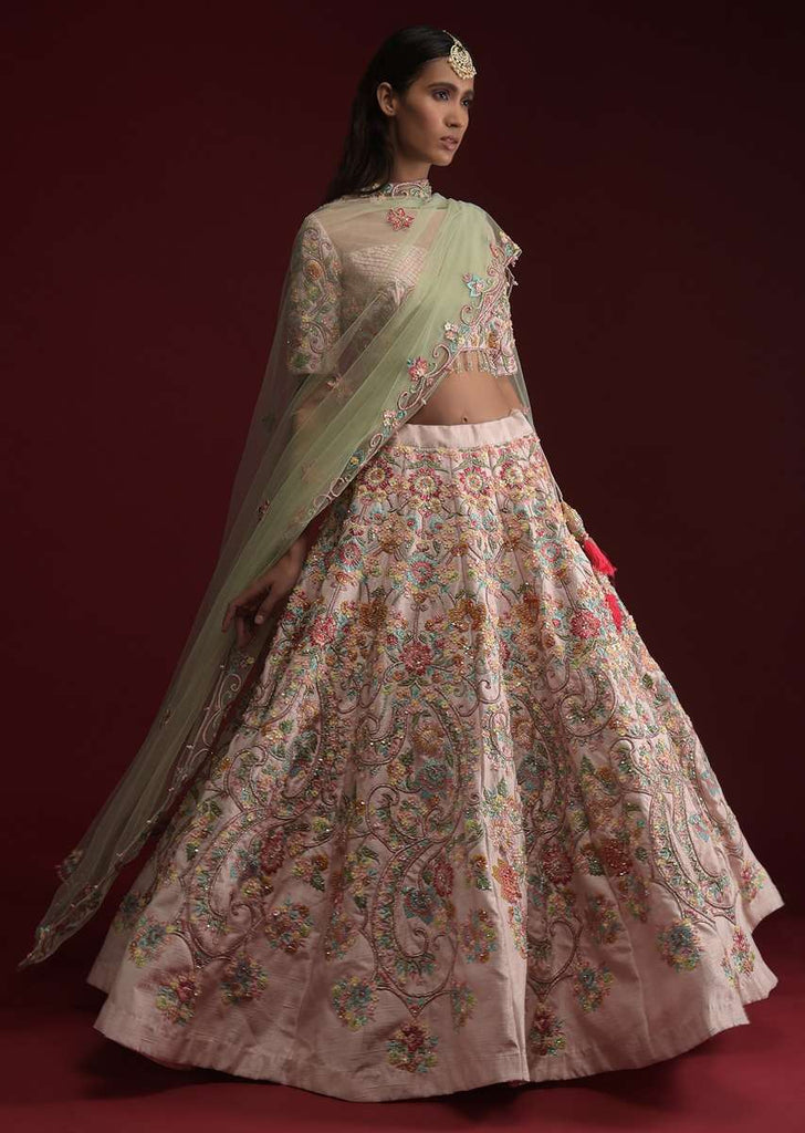 Powder Pink Lehenga Choli In Raw Silk With Hand Embroidered Floral Kalis Using Colorful Resham And Flower Sequins Online - Kalki Fashion