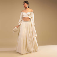Powder White Lehenga And Off Shoulder Crop Top With Bishop Sleeves, Hand Embroidery And An Elaborate Bow