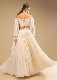 Powder White Lehenga And Off Shoulder Crop Top With Bishop Sleeves, Hand Embroidery And An Elaborate Bow