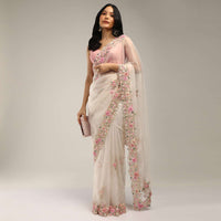 Powder White Saree In Organza With 3D Flower Embroidered Border And Buttis Featuring Multi Colored Moti And Sequins