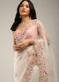 Powder White Saree In Organza With 3D Flower Embroidered Border And Buttis Featuring Multi Colored Moti And Sequins