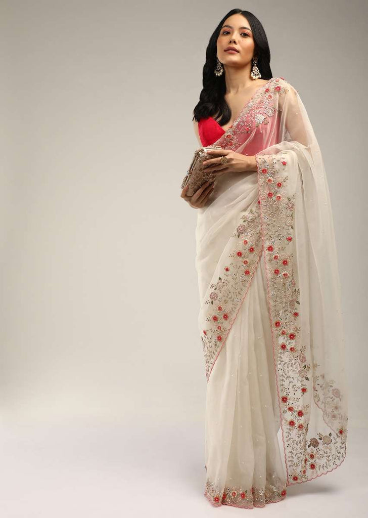 Powder White Saree In Organza With Colorful Resham Flowers On The Border Along With Moti And Cut Dana Accents