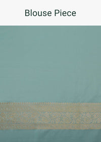 Powder Blue Embroidered Banarasi Satin Saree With Golden Butta Weave