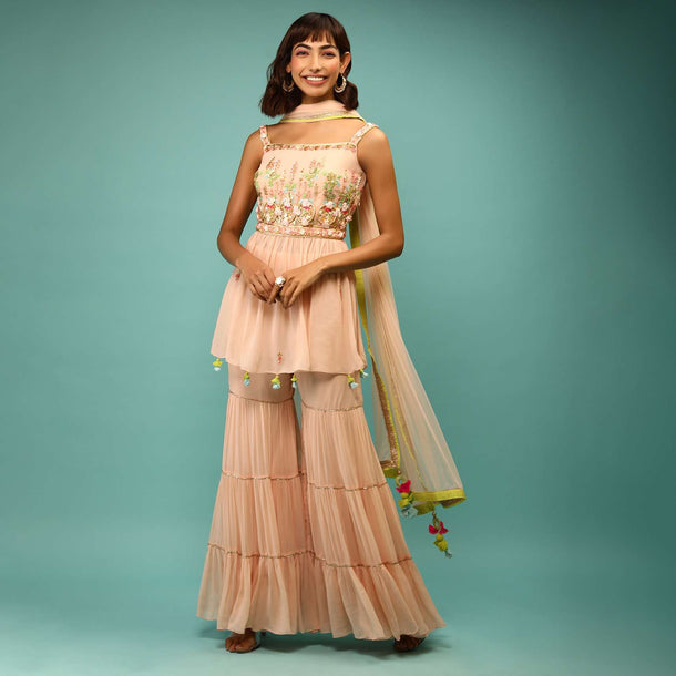 Powder Peach Sharara And Peplum Suit With 3D Satin Flowers And Multi Colored Bead Work In Floral Motifs