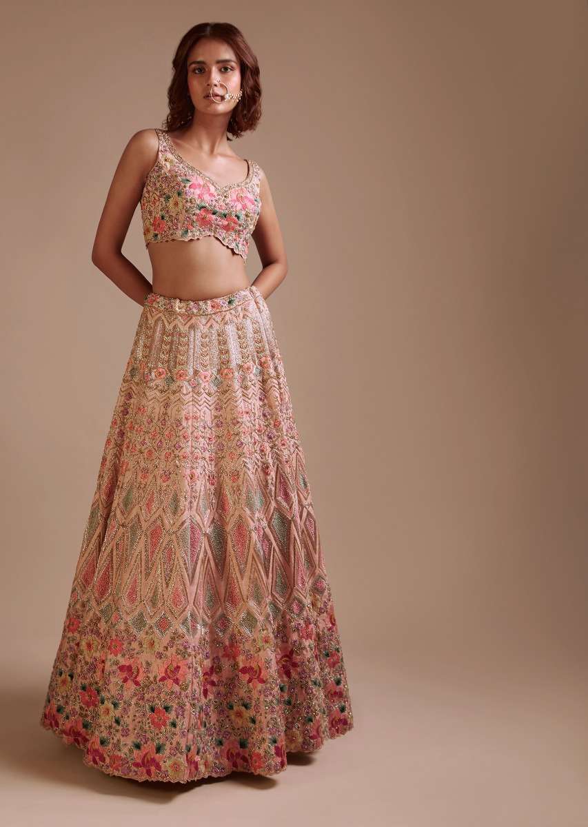 Powder Pink Lehenga Choli In Raw Silk With Colorful Resham And Sequins Embroidered Geometric And Floral Motifs