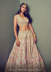 Powder Pink Lehenga Choli With Hand Embossed Embroidery Detailing In Ornate Floral Kalis And Mughal Motifs