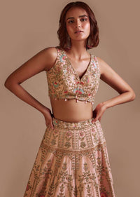 Powder Pink Lehenga Choli With Hand Embossed Embroidery Detailing In Ornate Floral Kalis And Mughal Motifs