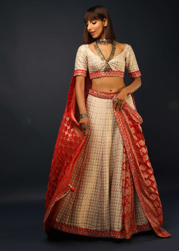 Powder White Lehenga Choli In Silk With Brocade Buttis And Red Bandhani Dupatta