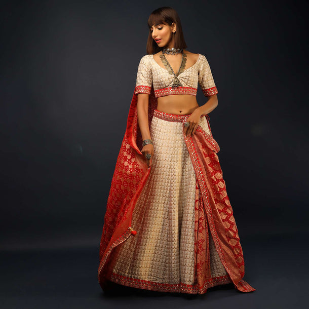 Powder White Lehenga Choli In Silk With Brocade Buttis And Red Bandhani Dupatta