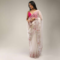 Powder White Saree In Organza With Multi Colored Sequins And Pita Zari Embroidered Floral Motifs On The Border