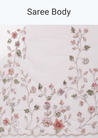 Powder White Saree In Organza With Multi Colored Sequins And Pita Zari Embroidered Floral Motifs On The Border