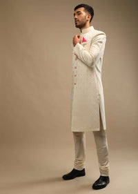 Pristine White Sherwani Set In Silk With Self Thread Embroidered Moroccan Jaal And Contrasting Pink Pocket Square