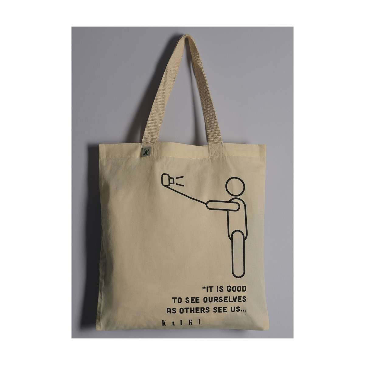 Off White Eco Friendly Bag With Printed Quotes Online - Kalki Fashion