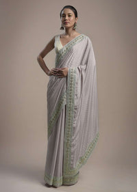 Powder Purple Saree In Crepe With Thread And Gotta Patti Embroidered Border And Unstitched Blouse Online - Kalki Fashion