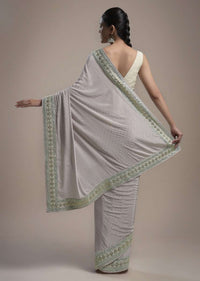 Powder Purple Saree In Crepe With Thread And Gotta Patti Embroidered Border And Unstitched Blouse Online - Kalki Fashion