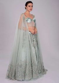 Aviary Blue Lehenga In Embroidered Velvet Paired With Matching Corset With Attached Draped Dupatta Online - Kalki Fashion