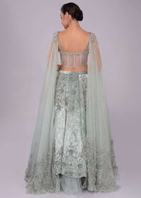 Aviary Blue Lehenga In Embroidered Velvet Paired With Matching Corset With Attached Draped Dupatta Online - Kalki Fashion