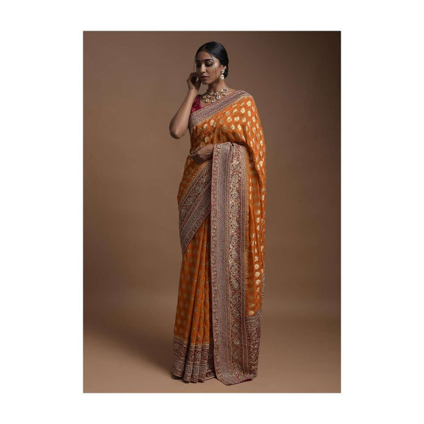 Pumpkin Orange Banarsi Saree In Georgette With Weaved Floral Mesh And Floral Jaal On The Red Pallu Online - Kalki Fashion