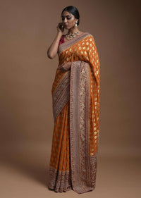 Pumpkin Orange Banarsi Saree In Georgette With Weaved Floral Mesh And Floral Jaal On The Red Pallu Online - Kalki Fashion