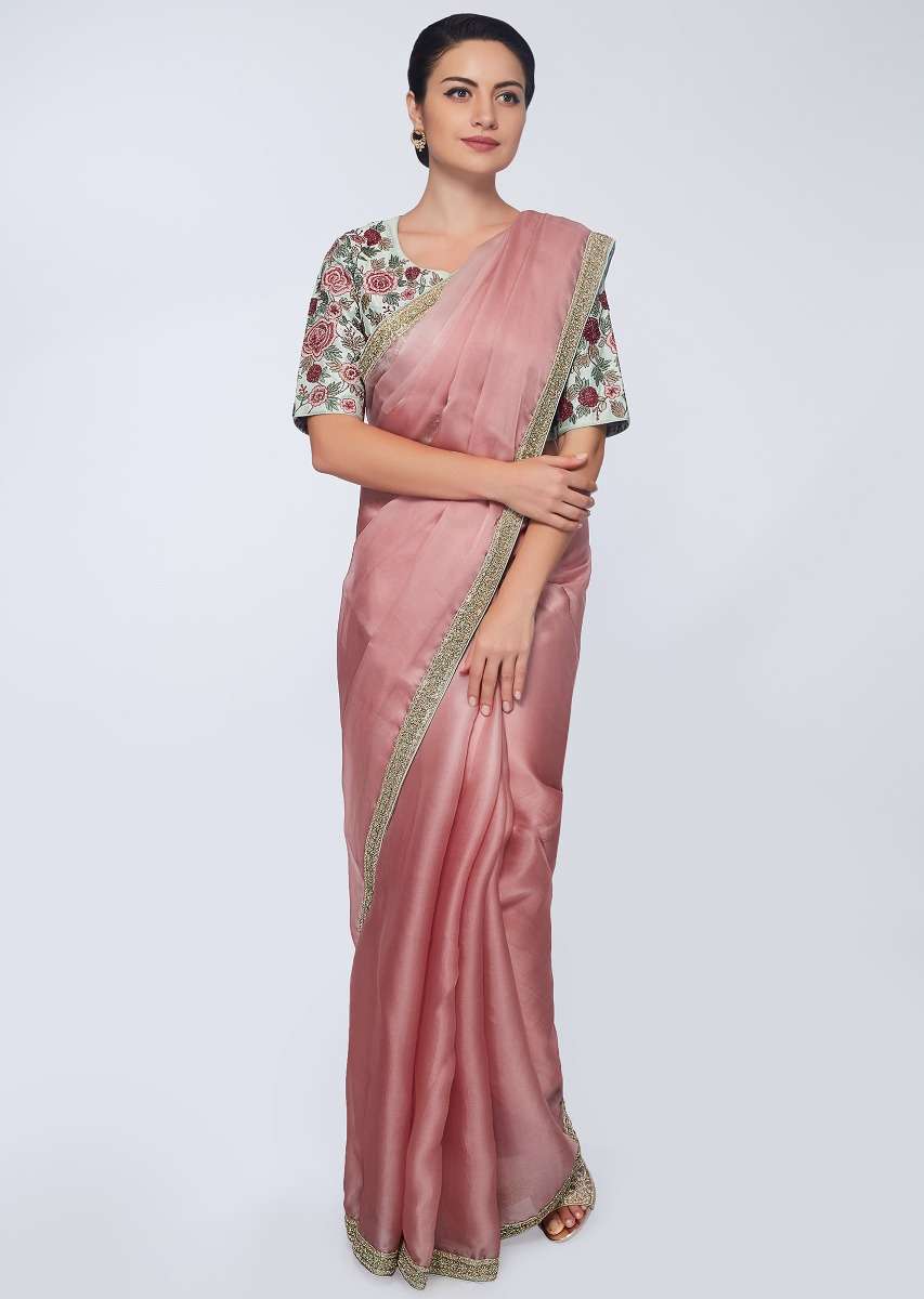 Punch pink organza saree with heavy embroidered border