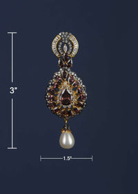 Purple Crystal Studded Drop Shaped Danglers With Stones And Dangling Pearl Online - Kalki Fashion