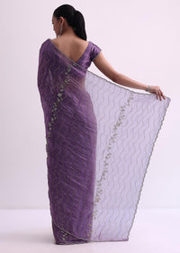 Purple Satin Saree With Cutdana Embellishment And Unstitched Blouse Fabric