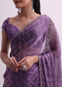 Purple Satin Saree With Cutdana Embellishment And Unstitched Blouse Fabric