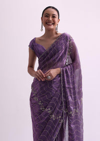 Purple Satin Saree With Cutdana Embellishment And Unstitched Blouse Fabric