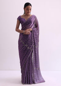 Purple Satin Saree With Cutdana Embellishment And Unstitched Blouse Fabric