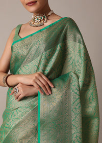 Rama Green Banarasi Tanchui Silk Saree With Tassel Detail And Unstitched Blouse Piece