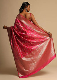 Rani Pink Banarasi Saree In Pure Handloom Silk With Woven Floral Jaal And Chevron Border Along With Unstitched Blouse Piece