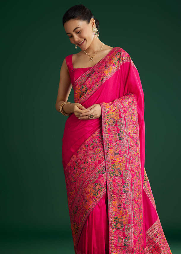 Rani Pink Dola Silk Woven Saree With Floral And Animal Prints