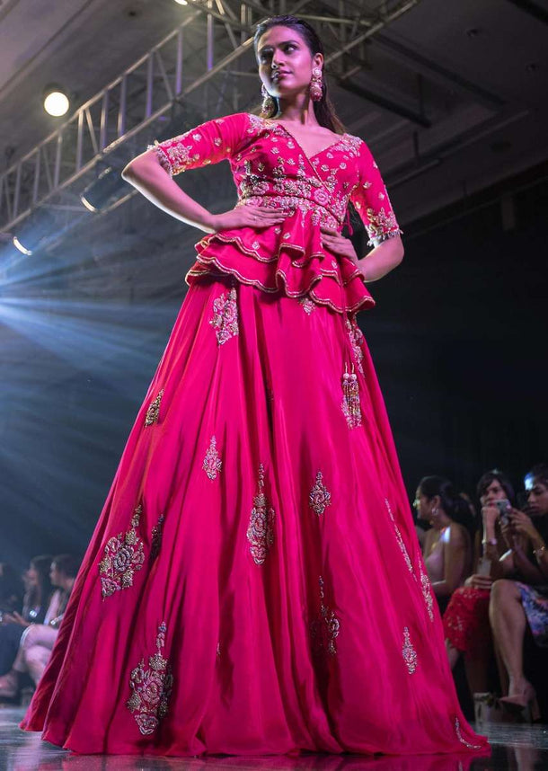 Fuschia Rose Lehenga And Peplum Top With Hand Embroidered Embossed Work