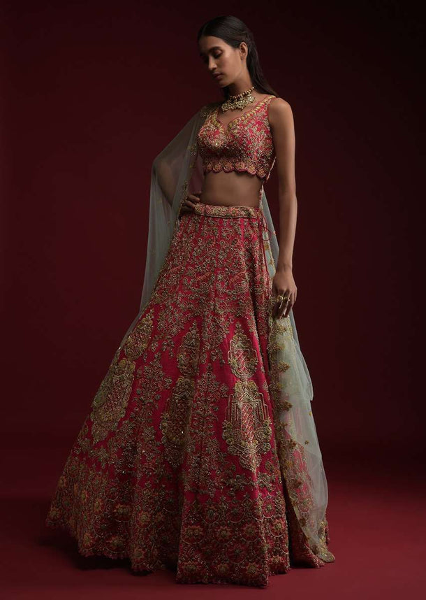 Rani Pink Lehenga Choli In Raw Silk With Hand Embossed Embroidery In Chandelier And Floral Motifs Online - Kalki Fashion