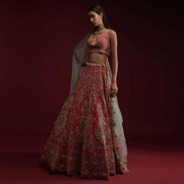 Rani Pink Lehenga Choli In Raw Silk With Hand Embossed Embroidery In Chandelier And Floral Motifs Online - Kalki Fashion