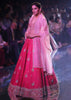 Fuschia Rose Lehenga Choli With Hand Embroidered Buttis In Embossed Embroidery