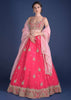 Fuschia Rose Lehenga Choli With Hand Embroidered Buttis In Embossed Embroidery