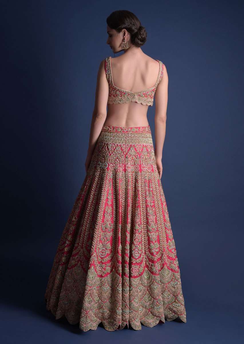 Fuschia Rose Lehenga Choli With Heavy Embossed Floral Embroidery In Kali Pattern