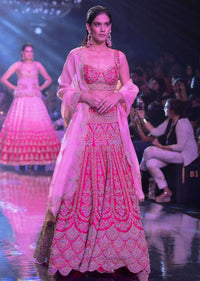 Fuschia Rose Lehenga Choli With Heavy Embossed Floral Embroidery In Kali Pattern