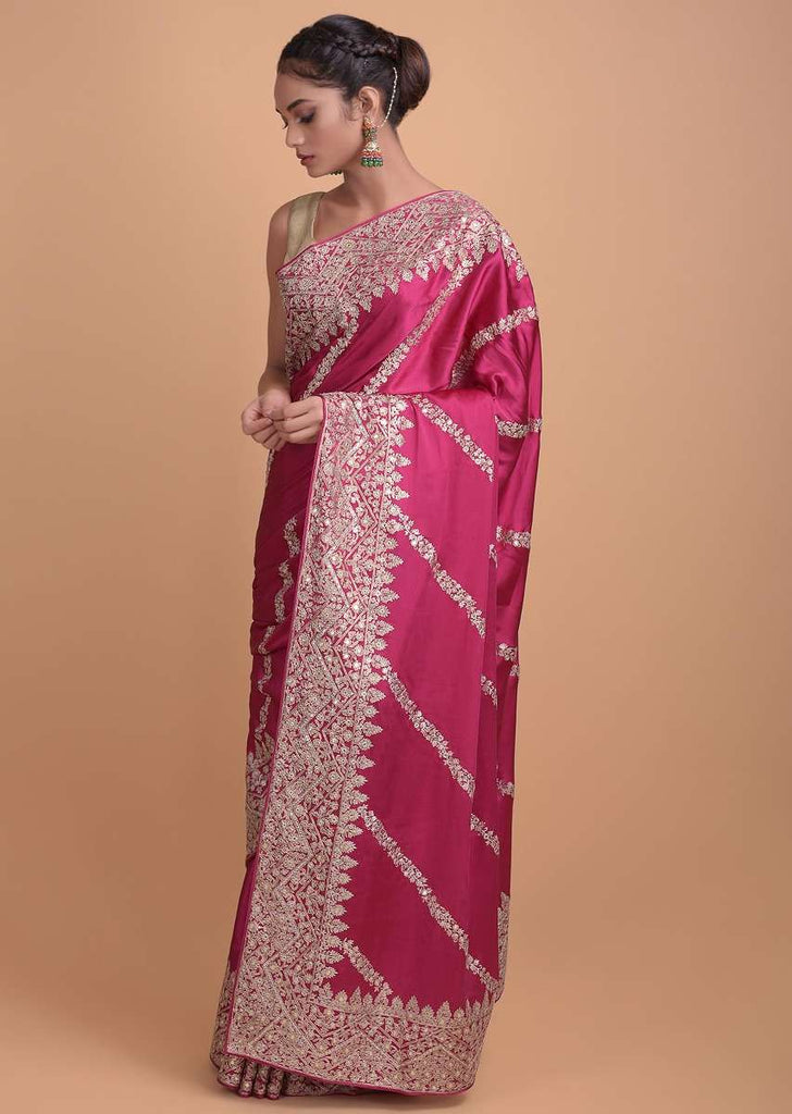 Rani Pink Saree In Satin With Zari And Sequins In Floral And Zig Zag Pattern On The Border Online - Kalki Fashion