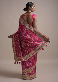 Rani Pink Saree In Silk With Ikkat Weaved Patola Pattern All Over And Gotta Embroidered Border Online - Kalki Fashion