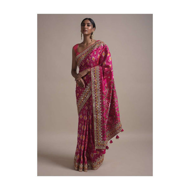 Rani Pink Saree In Silk With Ikkat Weaved Patola Pattern All Over And Gotta Embroidered Border Online - Kalki Fashion