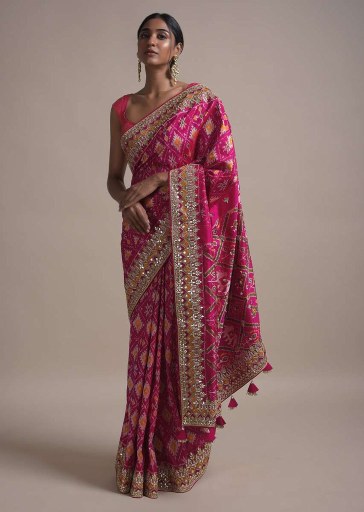 Rani Pink Saree In Silk With Ikkat Weaved Patola Pattern All Over And Gotta Embroidered Border Online - Kalki Fashion