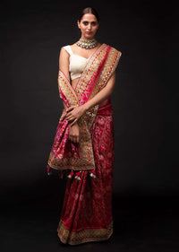 Rani Pink Saree In Silk With Ikkat Weaved Patola Pattern And Embroidery Work Online - Kalki Fashion