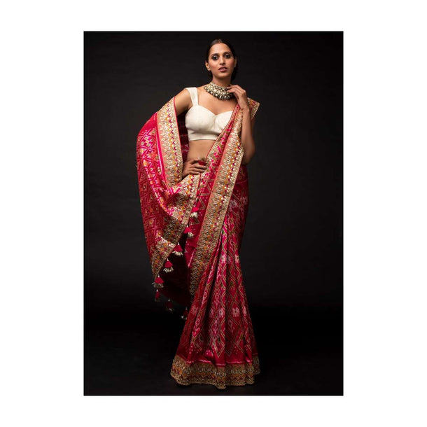 Rani Pink Saree In Silk With Ikkat Weaved Patola Pattern And Embroidery Work Online - Kalki Fashion